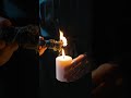 A Person Holding a Lighted Candle