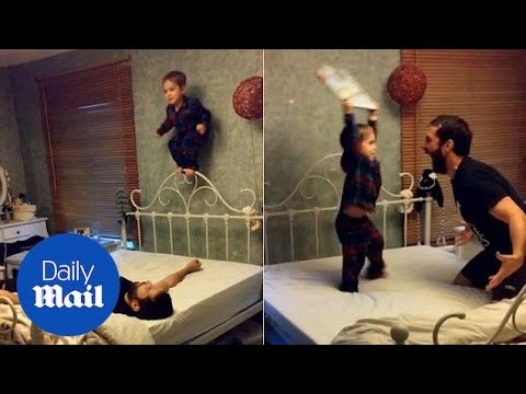 Father son smackdown! Dad stages cute wrestling competition - Daily Mail