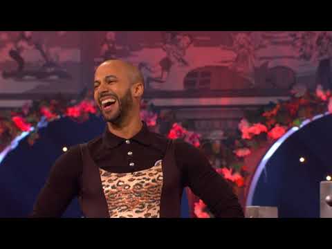 Marvin Humes wrestles a giraffe on Celebrity Juice