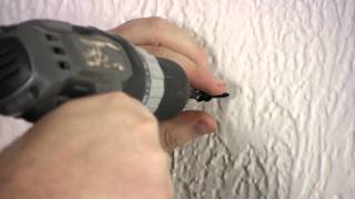How to Use a Drill to Hang a Picture : Nails, Screws &amp; Wall Hangings