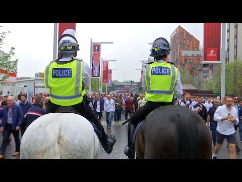 Fans doing battle at Wembley - special report on the cost of policing football in London | ITV News