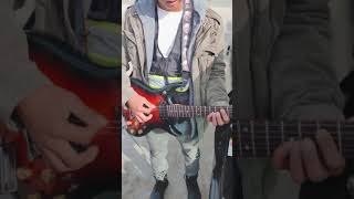 Homeboy James playing a bootleg  PRS electric guitar at a job site. #friday