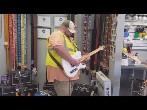 Matthew Brown test driving a Tagima TW-55 T style guitar.  Oh, my goodness!