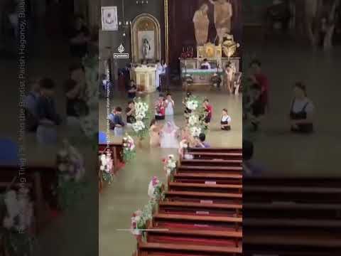 Bride walks down the aisle despite waist-deep flooding | AJ #shorts