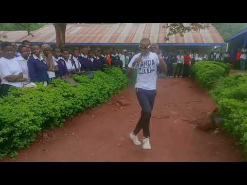 Kiracha Stephen  officially performing his original song Panda miti  in Rock High school Tororo