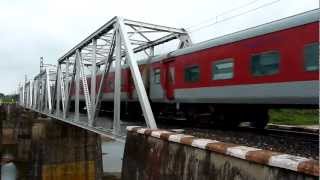 preview picture of video 'Speedster WAP-7 LHB Bengaluru Rajdhani shakes Machna bridge!!'