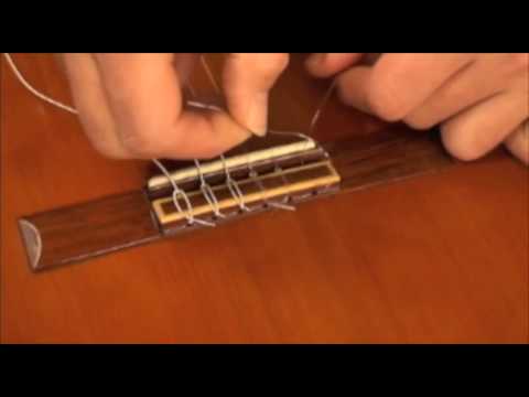 comment monter des cordes nylon sur une guitare