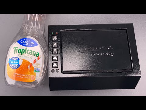 [1022] Homak Gun Safe Opened With Orange Juice Bottle