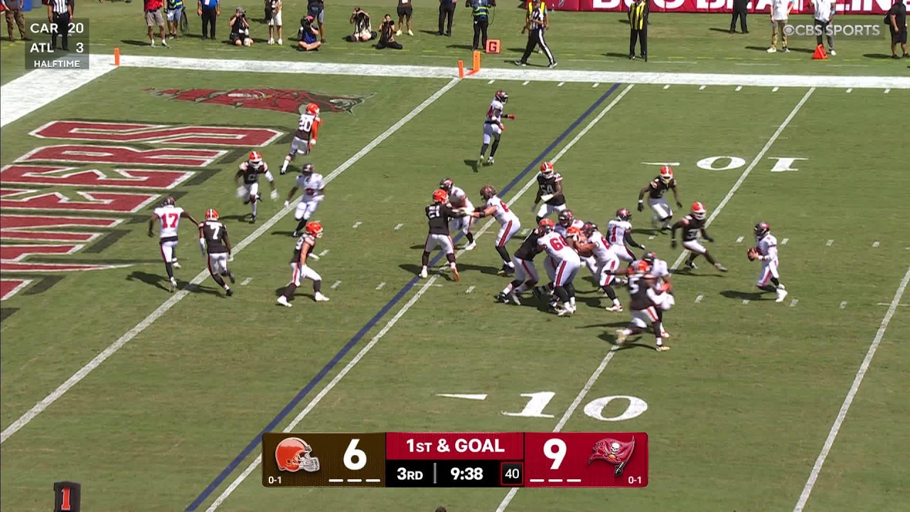 Baker Mayfield dances in the pocket to find Egbuka for the TD