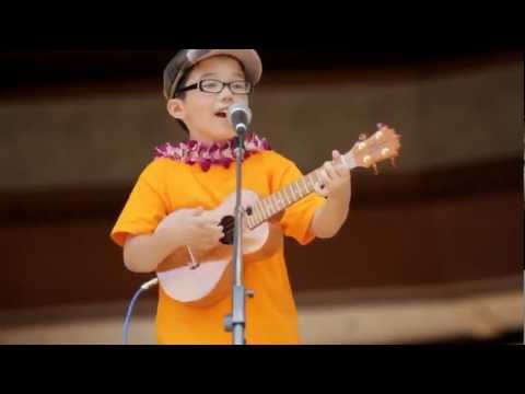 Cute 8-year old boy singing Train's 
