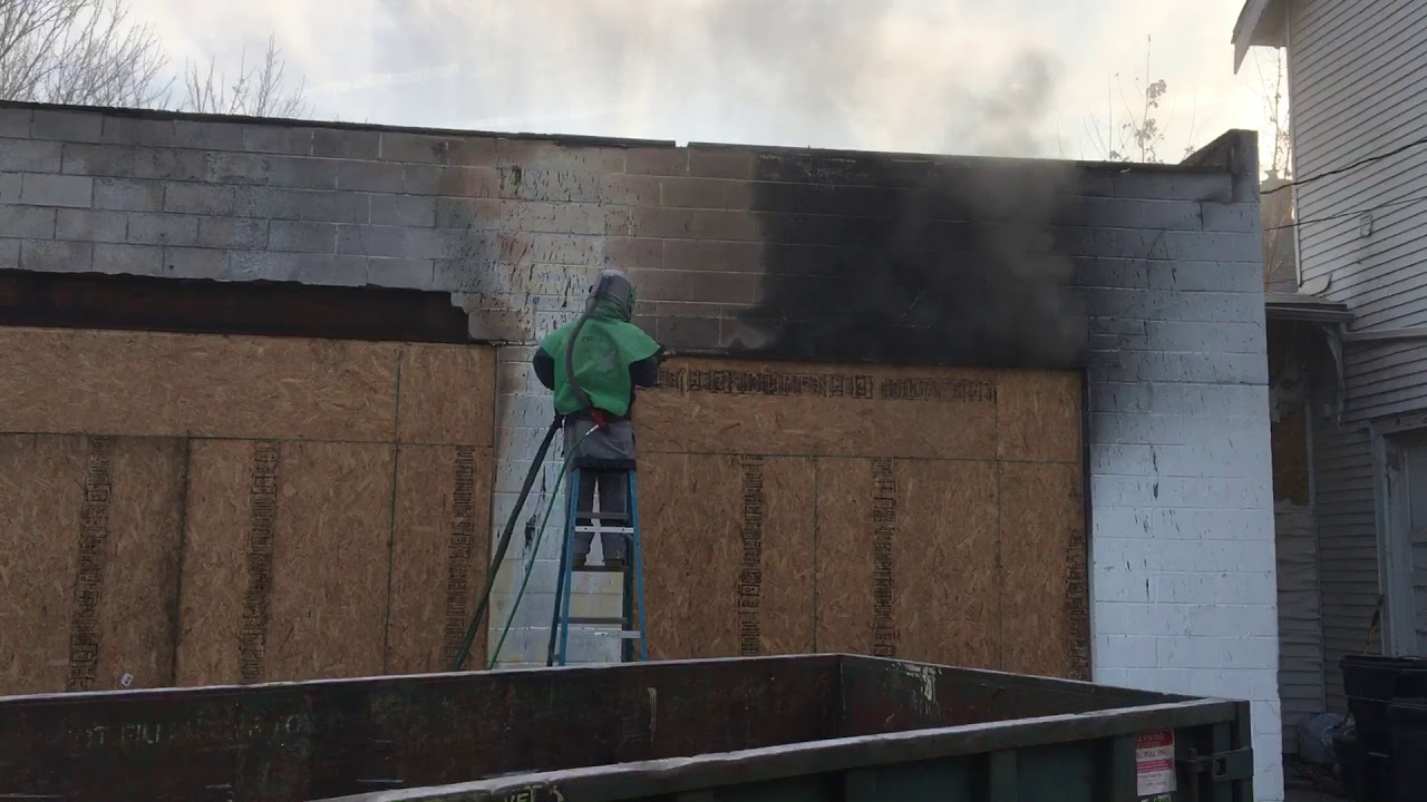 Fire damage surface restoration sand blaster cleaning smoke soot