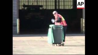 WRAP  Singer Boy George begins  community service, cleans up yard