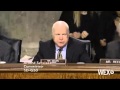 John McCain blasts 'low-life scum' protesters