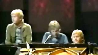 "Walk Right Back" by Harry Nilsson