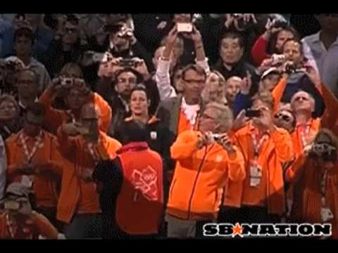 Beer bottle thrower caught on film at 100m final sprint London 2012