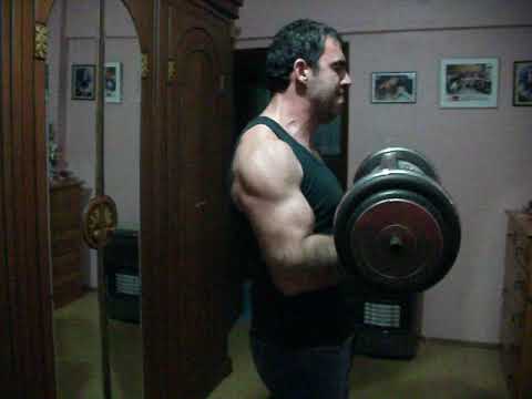 60kg very thick handled 2 hands half motion hammer curl.. Early 2012 at 78kg..