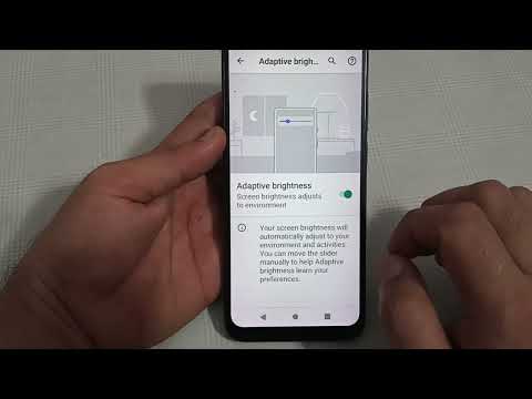 how to enable adaptive brightness in Moto g13, Moto g13 adaptive brightness setting