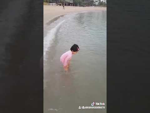 Deepti playing on beach