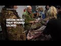 Ukraine medics treat wounded soldiers near Bakhmut