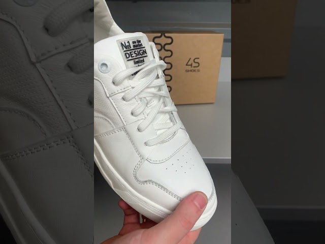 Чоботи жіночі шкіряні байка хутро 592641 Чорний Кеди чоловічі шкіряні 588057 Білі