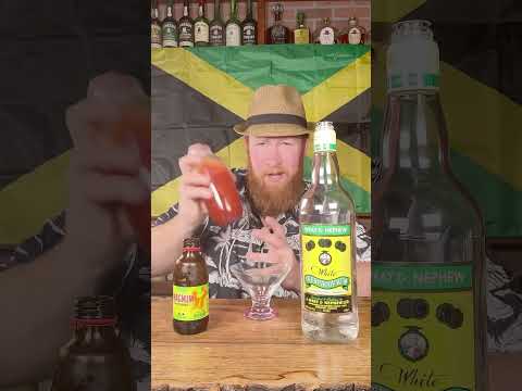 He's TRYING Jamaica 🇯🇲  Wray and nephew rum mixed with magnum tonic wine/pineapple juice 😋 😩 #fyp