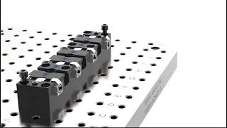 The process of indicating a vise on a Grid Plate