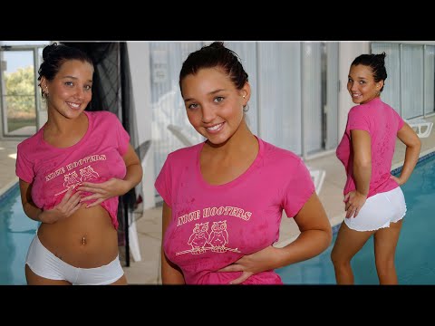 Christina Model - Pink T-Shirt & White short shorts in the pool