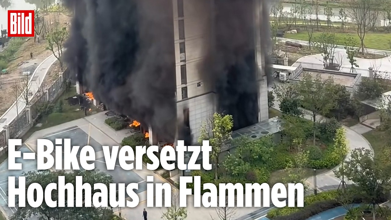 CHINA: Akku löst Feuer-Drama im 200-Meter-Turm aus