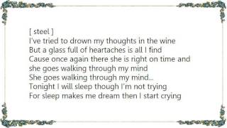 Ernest Tubb - She Goes Walking Through My Mind Lyrics