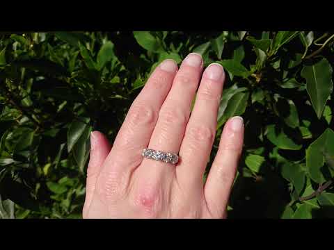 A platinum diamond five stone ring