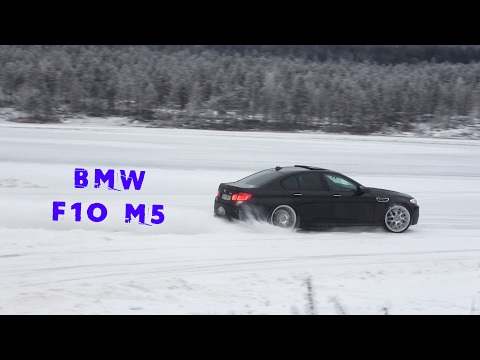BMW F10 M5 having fun on a frozen lake