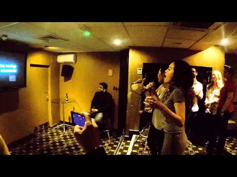 Rachelle Ann Go and Eva Noblezada singing  Chandelier