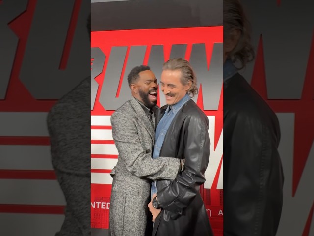 Lee Pace and Colman Domingo heating up The Running Man red carpet.