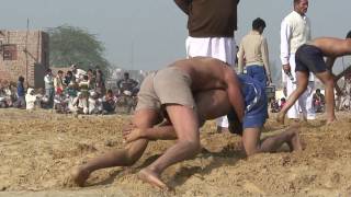 preview picture of video 'Traditional Indian Kushti wrestling at tournament - match 1'