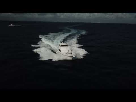 2006 Hatteras Enclosed Bridge JOLLEY ROGER Video