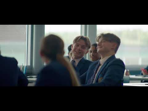 Jamie in glitter makeup from trailer close-up, signaling identity and performance merge