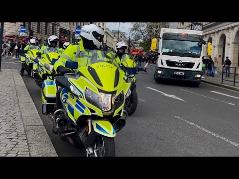 London Met Police Motorbikes close Trafalgar Sq