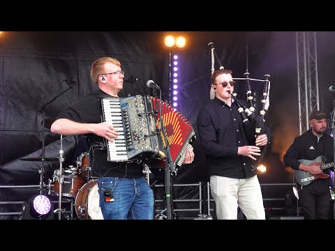 Scottish band Trail West playing live on stage during 2024 Crieff Highland Gathering in Scotland