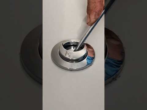 Desmontaje de pulsador doble de descargador roca en cisterna