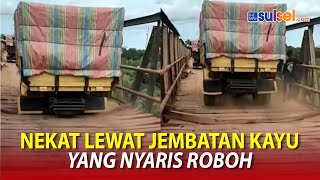 Download lagu Viral Video Truk Muatan Berat Nekat Lewat Jembatan Kayu yang Nyaris Roboh mp3