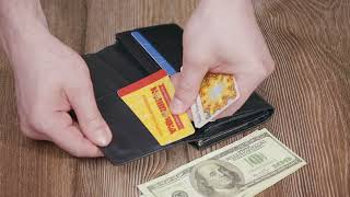 Добротне жіноче портмоне з кишенею для монет із натуральної шкіри ST Leather 22691 чорний