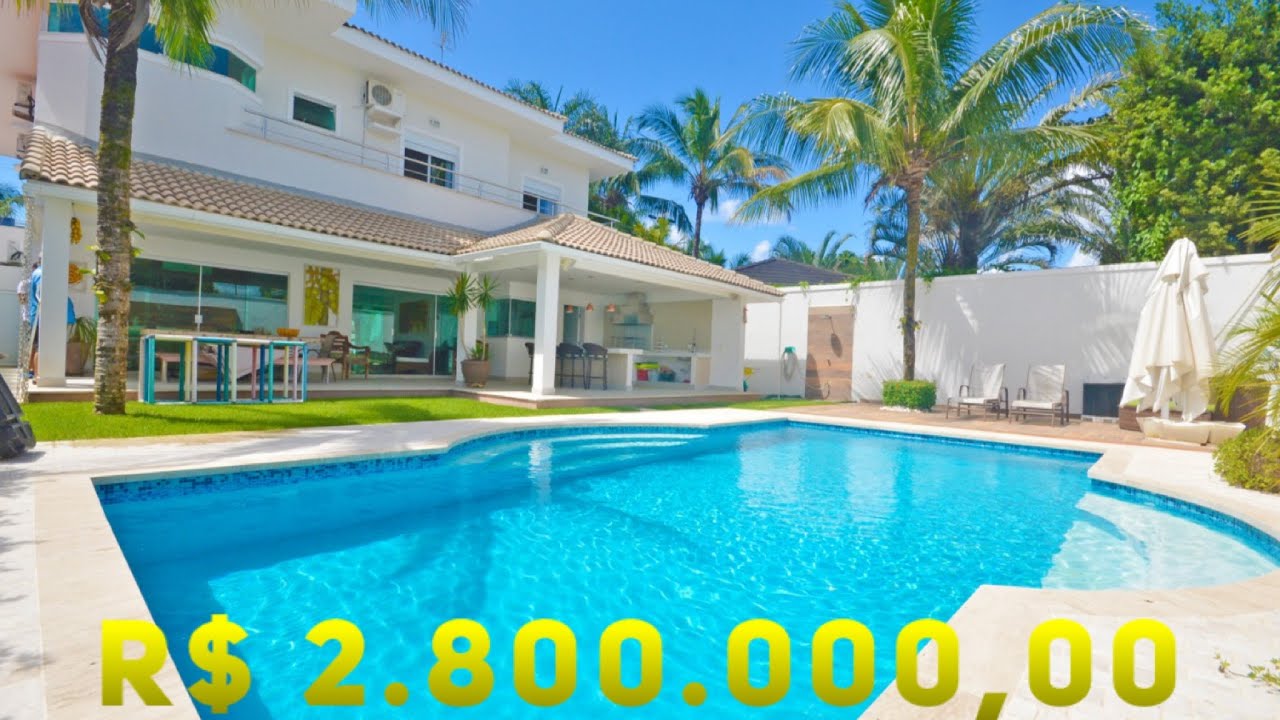 CASA ACONCHEGANTE À VENDA NO JARDIM ACAPULCO EM GUARUJÁ COM 5 SUÍTES POR R$ 2.800.000,00