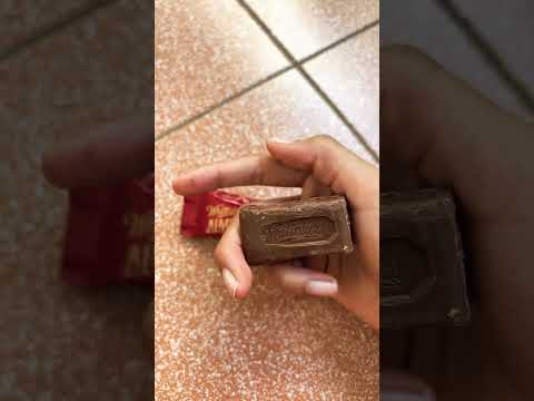 Opening Whittaker’s Almond Gold milk chocolate 🍫 ( mini bar)