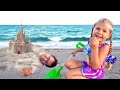 Diana and Roma have fun on the Beach with Daddy Diana and Roma have fun on the Beach with Daddy