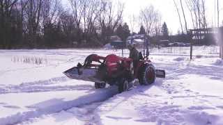 Tractor Crashes Through Pond's Ice