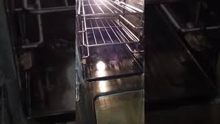 How to reinstall oven door on Jenn-air oven