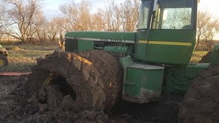 John Deere 8850 Tractor Stuck in Muddy Field in North Dakota Pulled Out by Another 8850