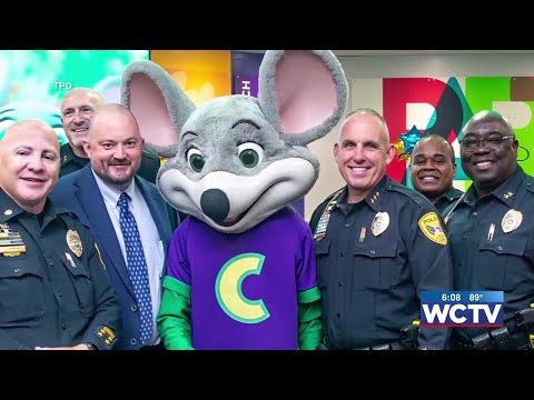 Mouse and police cheese for the camera as TPD and Chuck E. Cheese make amends after viral arrest