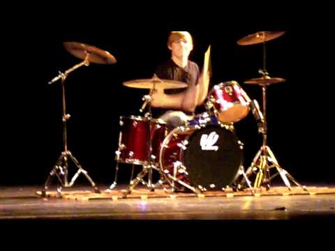Zachary Lewis performing a drum cover at Keller Central High Talent Show