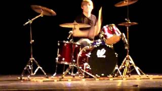 Zachary Lewis performing a drum cover at Keller Central High Talent Show